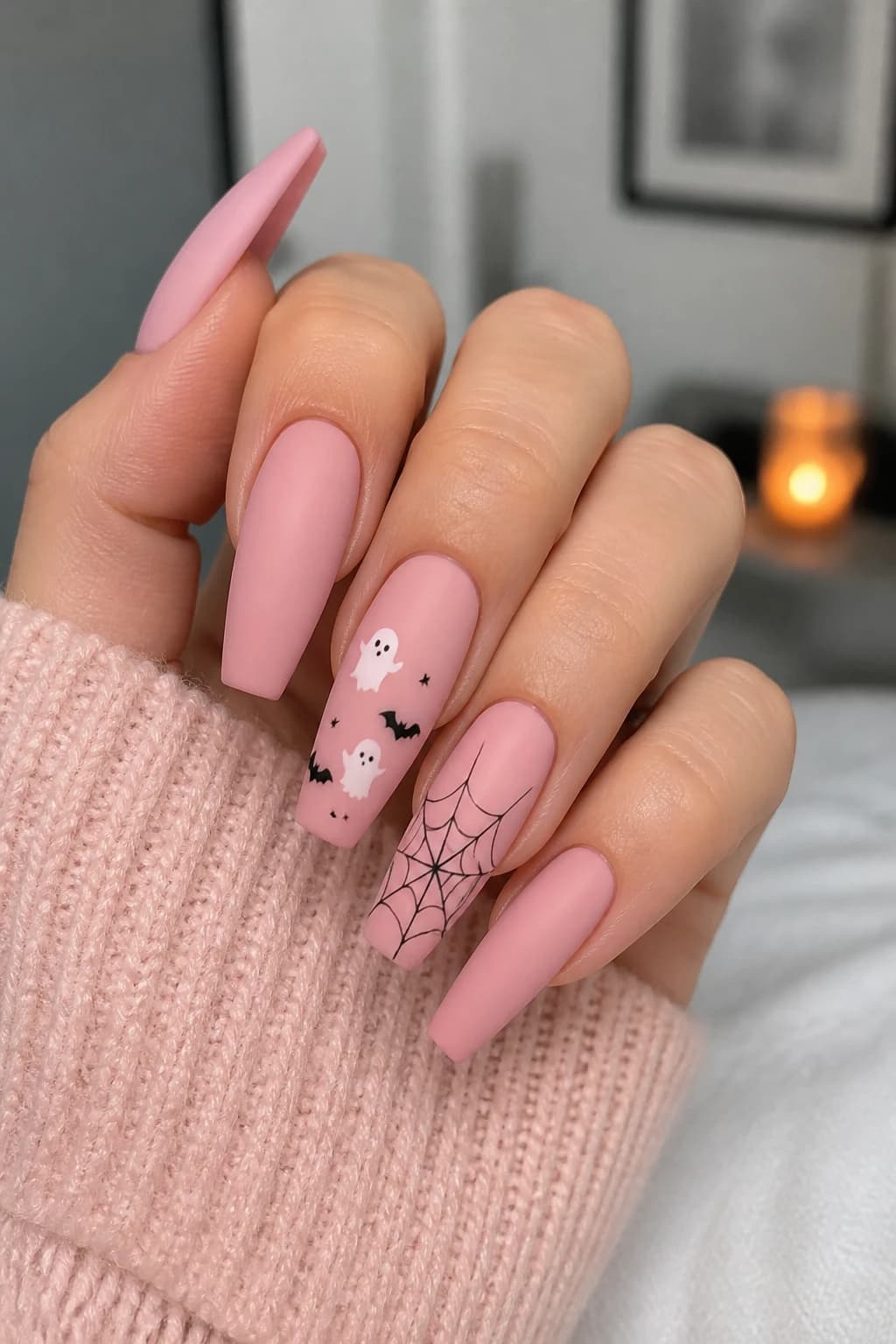 Long coffin nails in pink with a matte finish, Halloween nail design