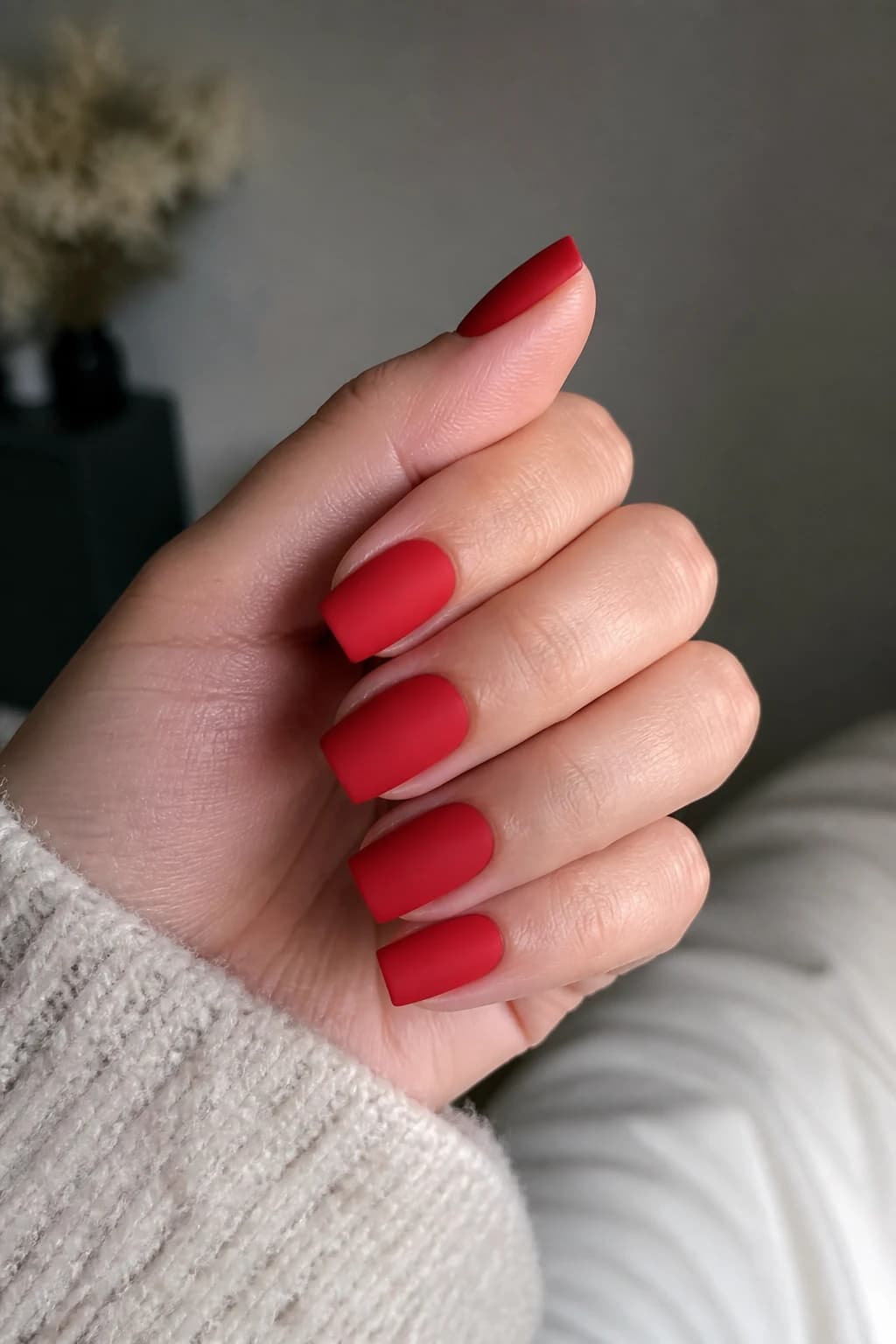 Medium square nails in red with a matte finish