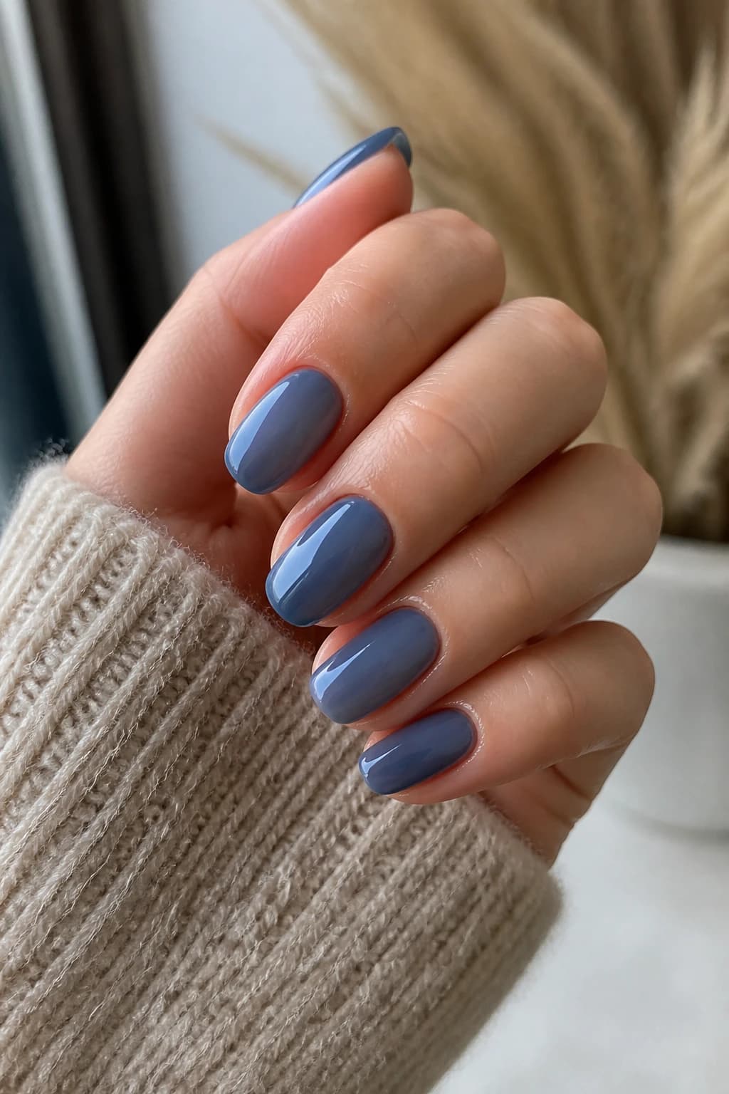 Medium oval nails in blue with a jelly design and a glossy finish, fall nail design
