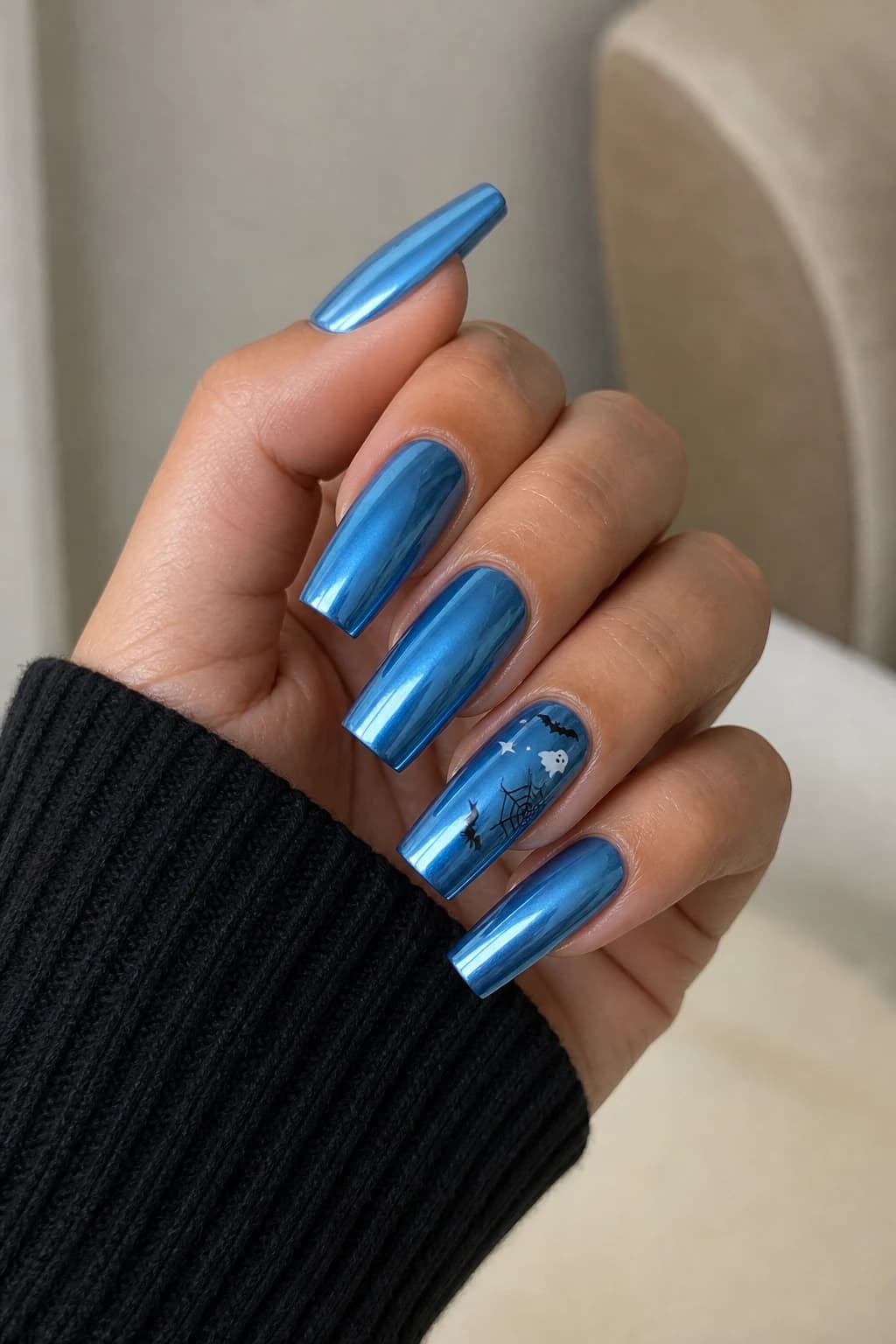 Long square nails in blue with a chrome finish, Halloween nail design