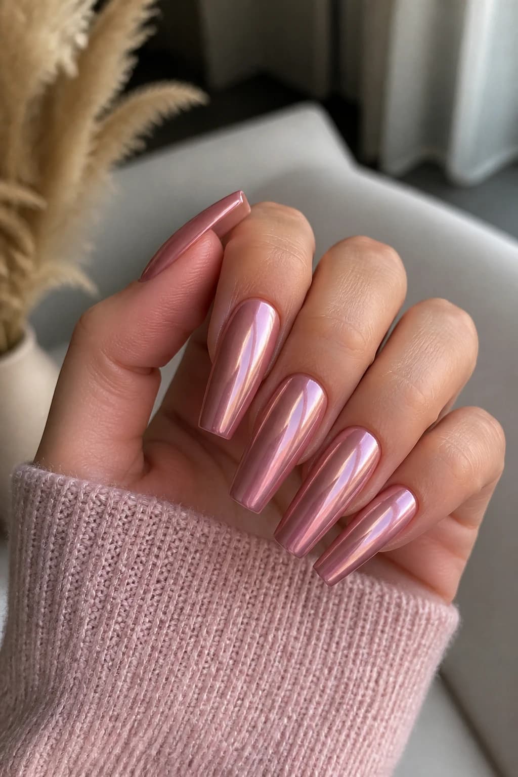 Long coffin nails in pink with a chrome finish, fall nail design