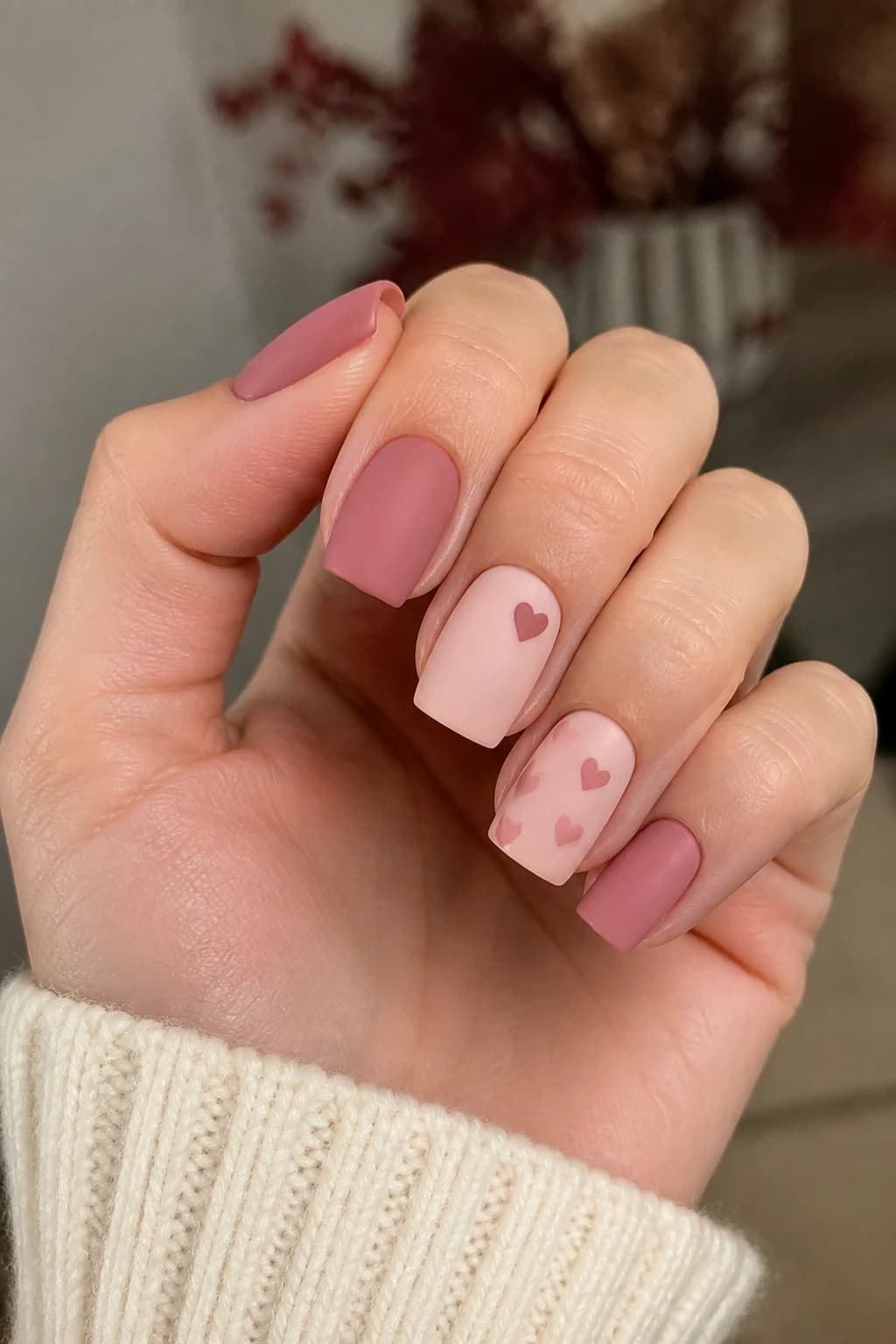 Medium square nails in pink with a heart design and a matte finish, fall nail design