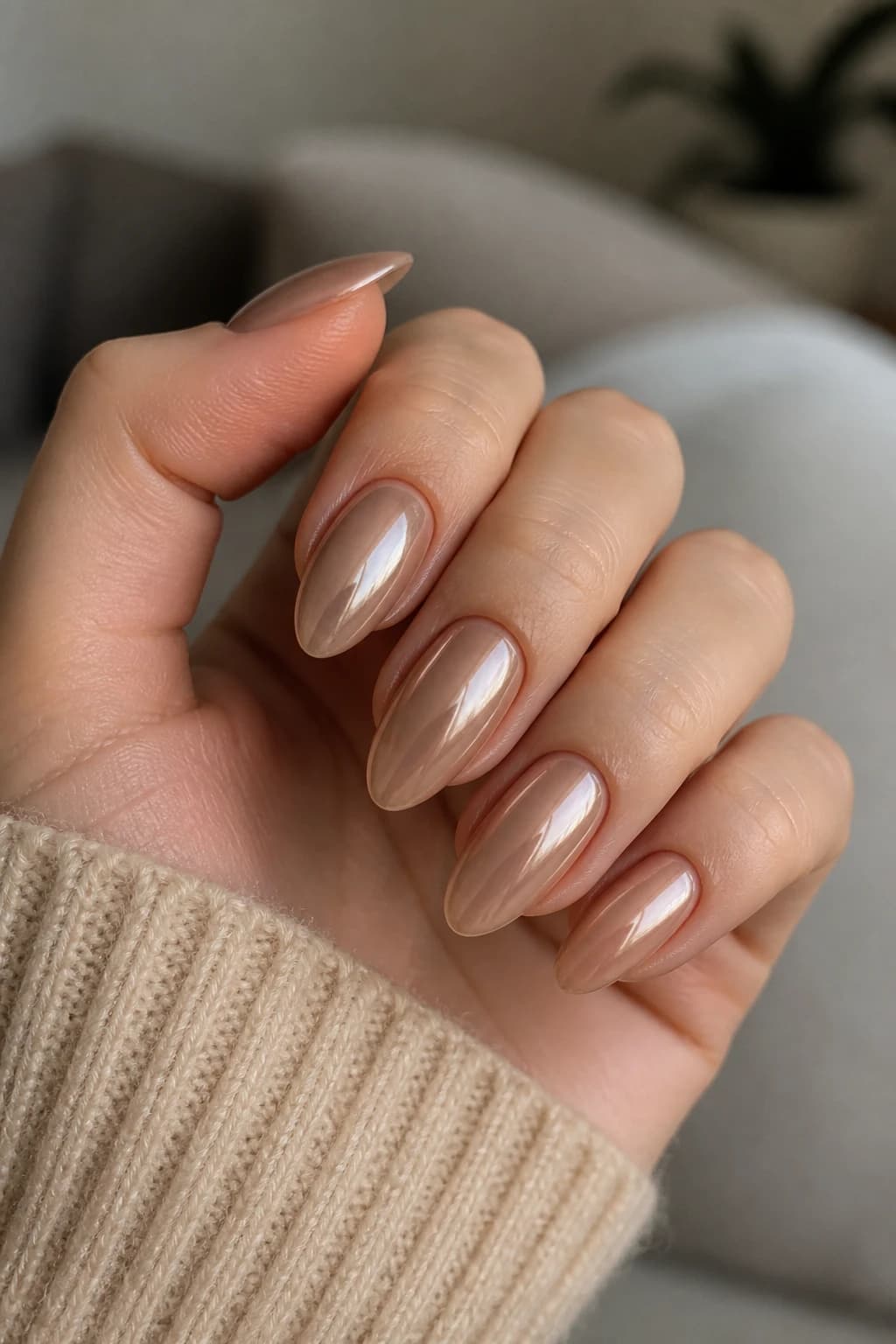 Long almond nails in nude with a chrome finish, fall nail design