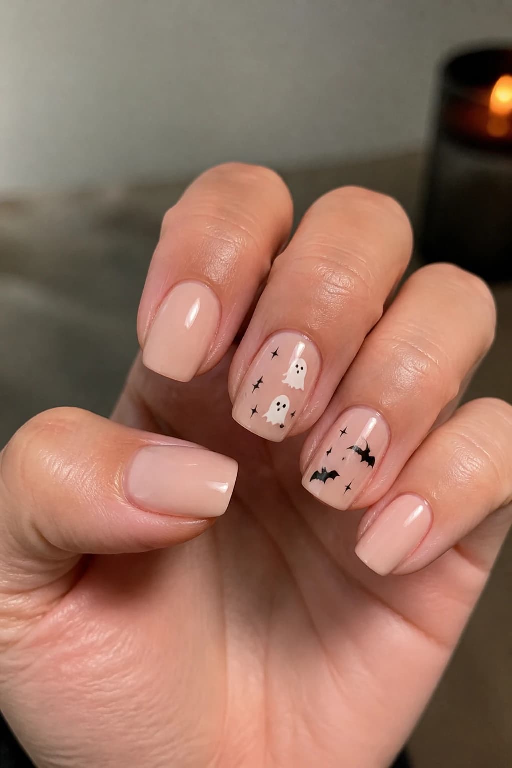Short coffin nails in nude with a glossy finish, Halloween nail design