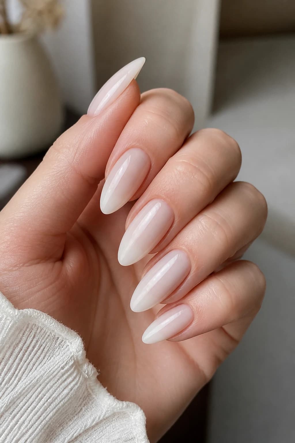 Long almond nails in white and cream with a jelly design and a matte finish